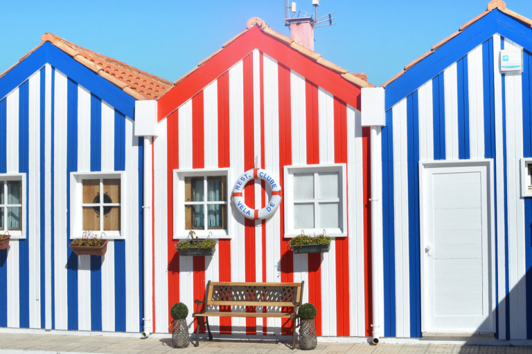 blue and red lake houses in aveiro. sitio office interieur cowowrking space. addition expansion to our existing locations.